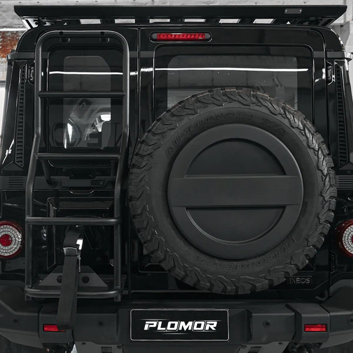 Rear tailgate ladder rack installed on INEOS Grenadier 2023+, enhancing off-road capability and rear access.