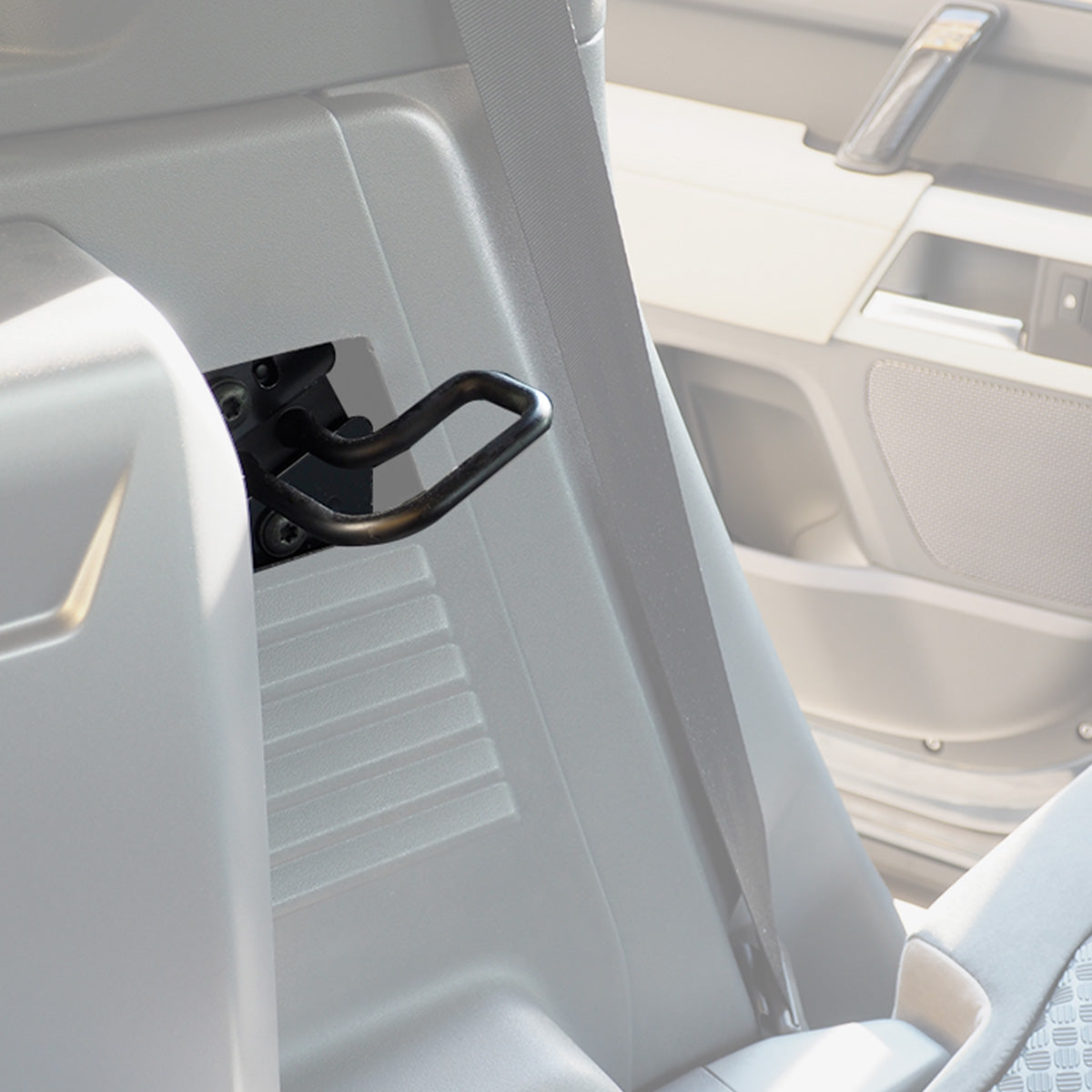 PLOMOR Rear Seat Recline Hook Installed Front View on Defender 110
