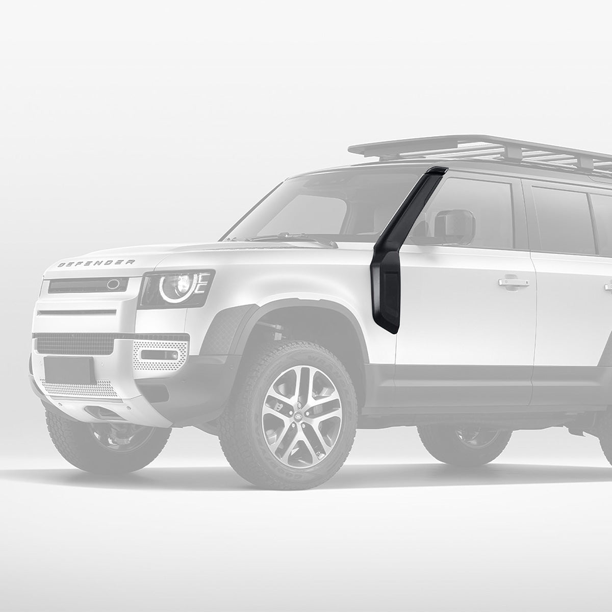 Defender equipped with PLOMOR snorkel kit for water crossings and dusty trails