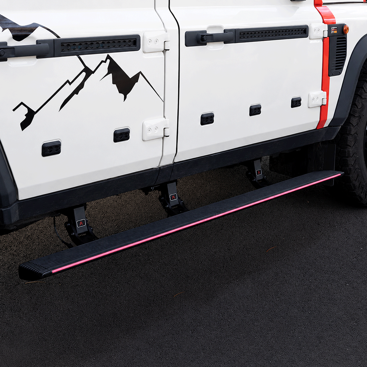 PLOMOR electric side steps installed on INEOS Grenadier 2023–2025 side view OEM+ LED running boards
