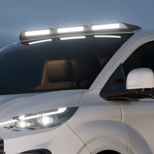 Upgrade your 2024+ Ford Transit Custom with a sleek gloss black triple LED roof light. This front-facing view highlights the bold design and seamless integration with your van’s original styling.
