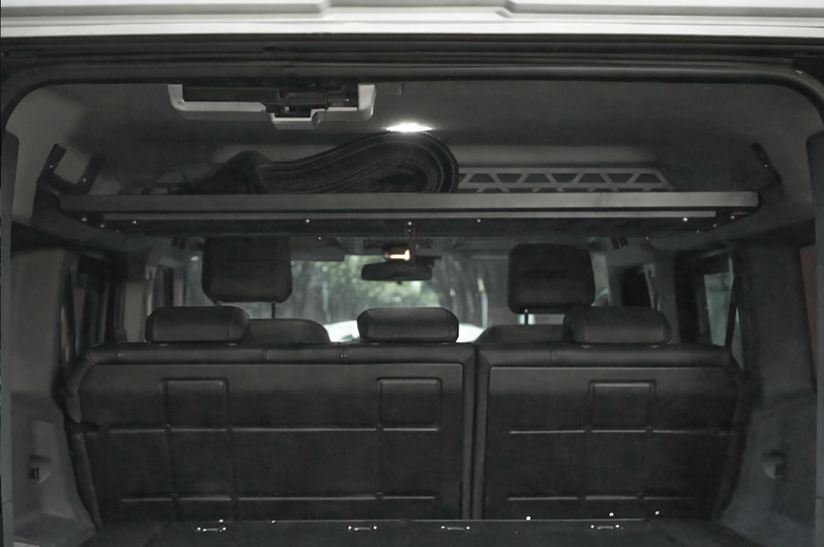 Upper Cargo Storage – Optimise Overhead Space - INEOS Grenadier Upper Rear Cargo Storage Shelf – Maximised Overhead Storage