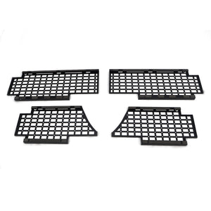 PLOMOR heavy-duty steel body side utility panel for Ineos Grenadier. Features a MOLLE grid system for mounting exterior overlanding and recovery gear.