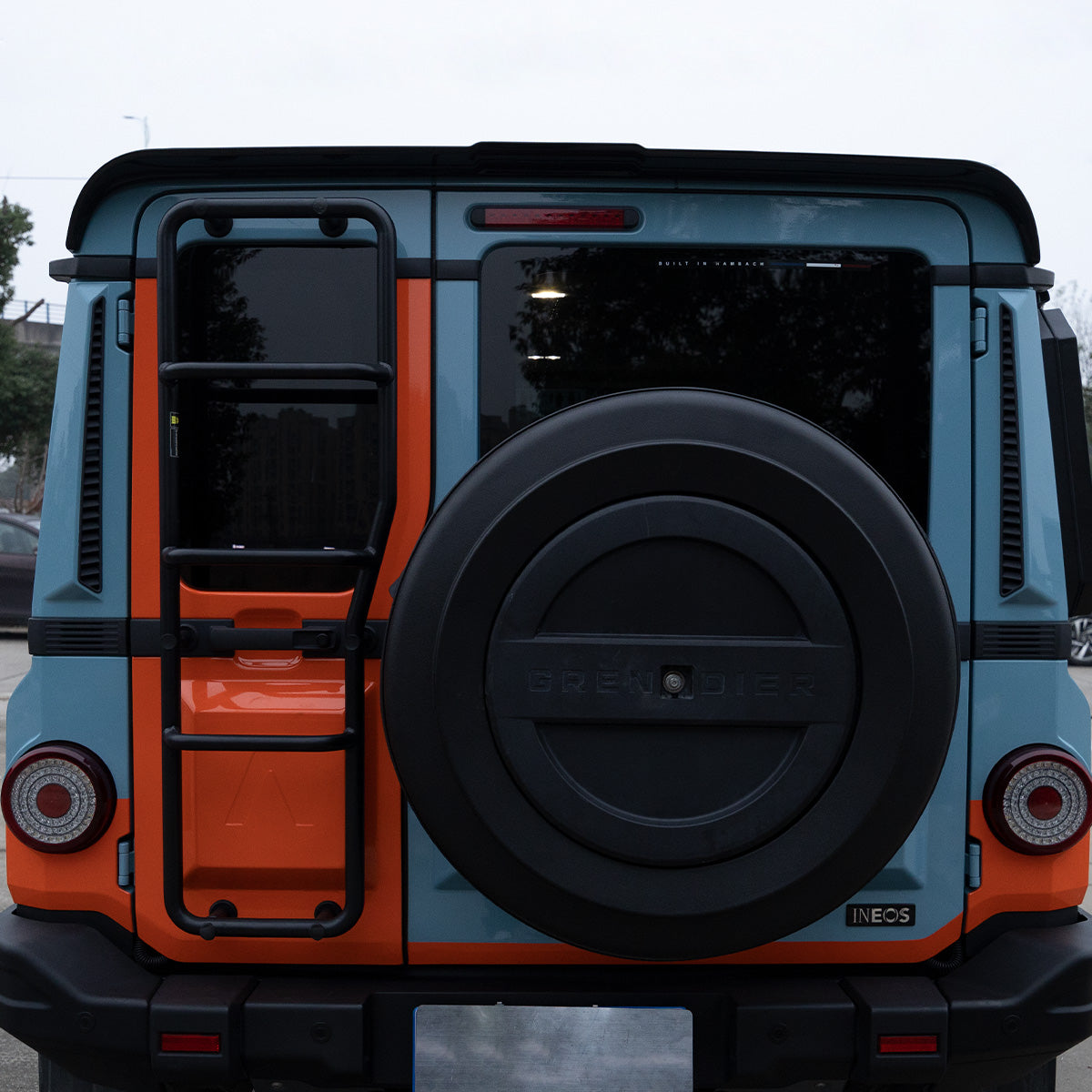 PLOMOR Rear Roof Spoiler perfectly installed on the INEOS Grenadier rear edge, providing a clean, factory-style look.