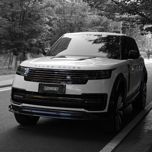 PLOMOR full dry carbon fibre body kit for Range Rover L460 (2023+), including front lip, fender flares, and rear diffuser, offering a lightweight, aggressive performance look.