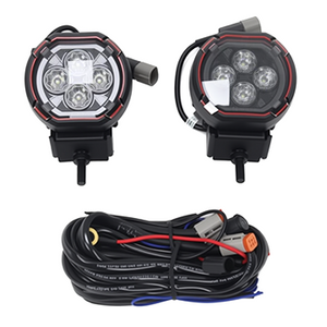 PLOMOR rugged, round LED spotlights for Ineos Grenadier. Features powerful white driving light and an integrated amber halo for DRL/turn signal function.