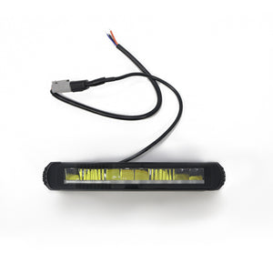 PLOMOR slimline LED light bar for Ineos Grenadier. Features durable aluminum housing and dual-mode white/amber illumination for auxiliary and signaling use.