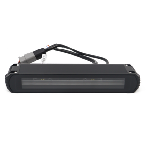 PLOMOR slimline LED light bar for Ineos Grenadier. Features durable aluminum housing and dual-mode white/amber illumination for auxiliary and signaling use.