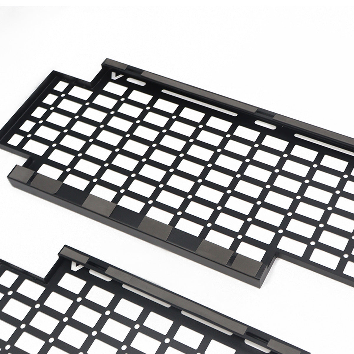 PLOMOR heavy-duty steel body side utility panel for Ineos Grenadier. Features a MOLLE grid system for mounting exterior overlanding and recovery gear.