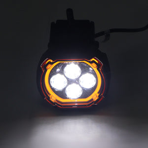 PLOMOR dual-function round LED spotlights for Ineos Grenadier. Features a powerful white beam and an amber halo DRL/turn signal in a custom, plug-and-play design