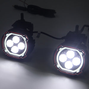 PLOMOR dual-function round LED spotlights for Ineos Grenadier. Features a powerful white beam and an amber halo DRL/turn signal in a custom, plug-and-play design.