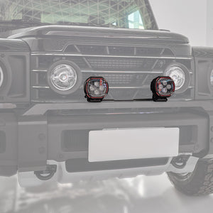 PLOMOR aluminium and steel front bumper light mount bracket for Ineos Grenadier. Gloss black finish, custom-fit for two spotlights or one light bar.