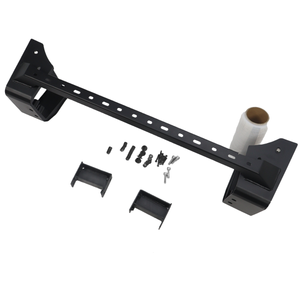 PLOMOR aluminium and steel front bumper light mount bracket for Ineos Grenadier. Gloss black finish, custom-fit for two spotlights or one LED light bar.