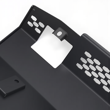 PLOMOR heavy-duty steel front skid plate for INEOS Grenadier. Provides robust undercarriage protection for the engine and differential during off-road use.