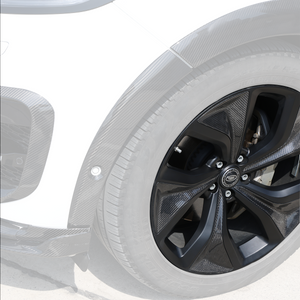 Close-up view of the forged alloy wheel for Range Rover Sport L461, highlighting the precision of the carbon fibre detailing and lightweight construction