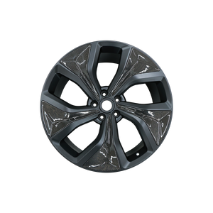 Close-up view of the forged alloy wheel for Range Rover Sport L461, highlighting the precision of the carbon fibre detailing and lightweight construction.