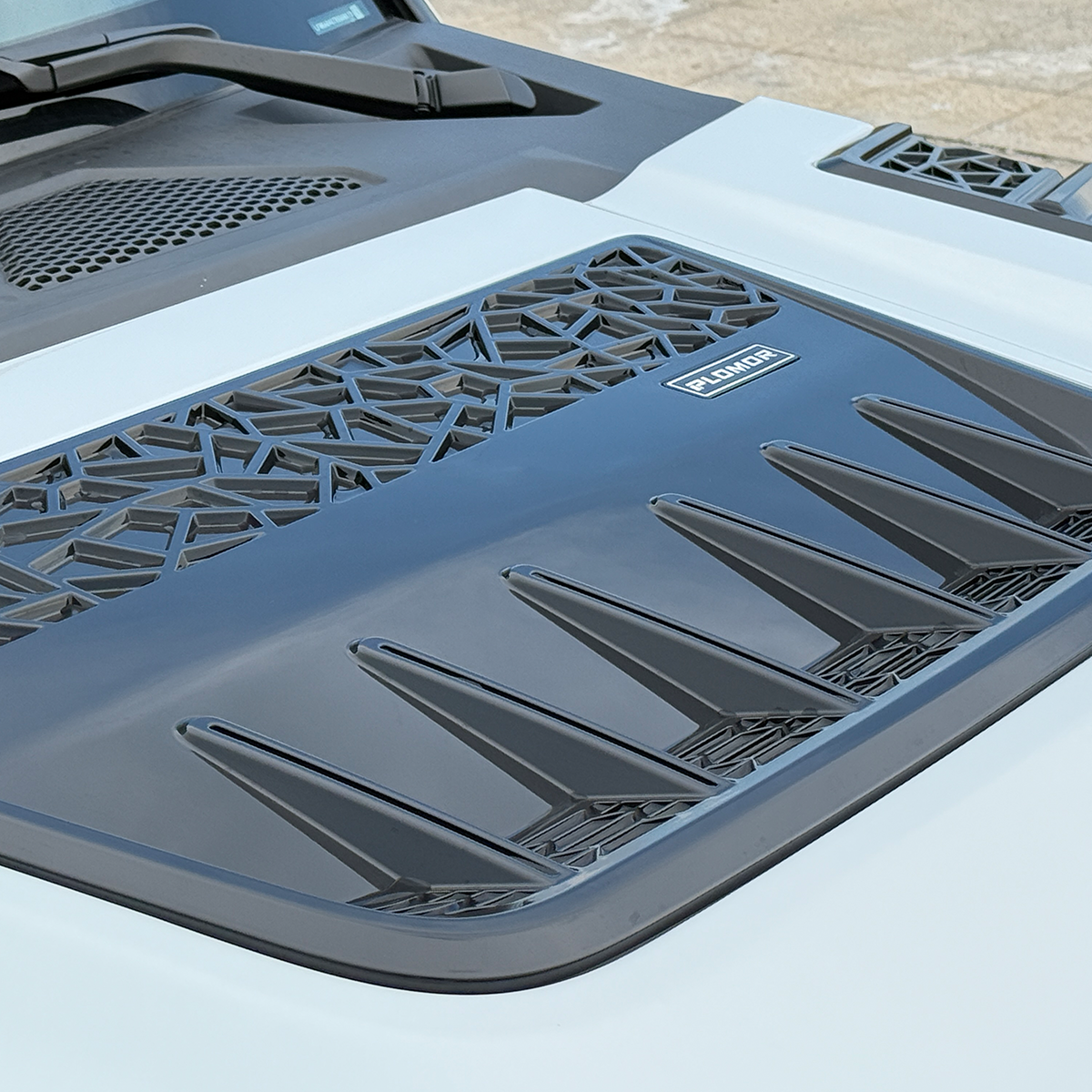 Aggressive off-road hood with hybrid construction, OEM compatible. Protects from debris, easy bolt-on install, ready for custom paint.