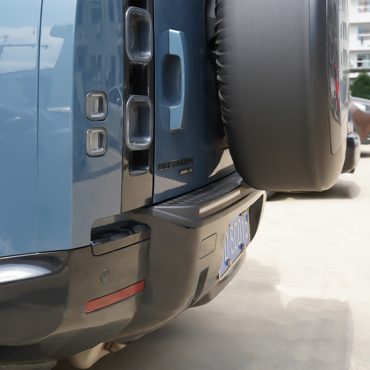 Side view of Defender 90/110 (L663) showing full-width carbon LED light bar installed