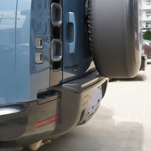 Side view of Defender 90/110 (L663) showing full-width carbon LED light bar installed