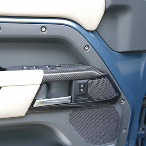 Gloss carbon fiber dashboard trim installed in Land Rover Defender interior