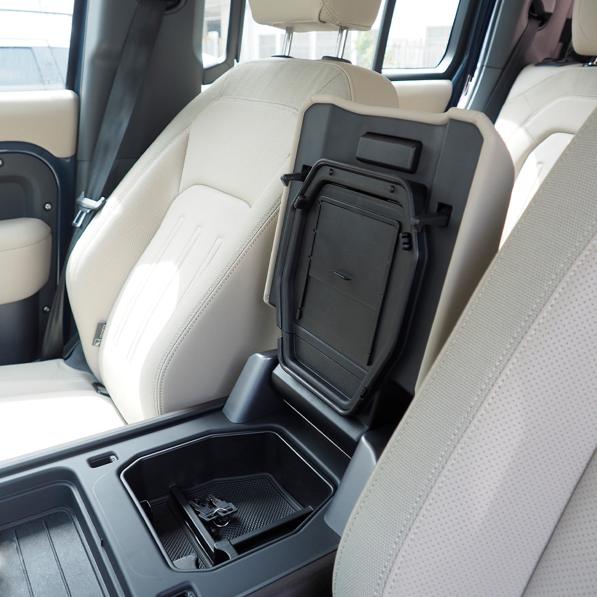 Defender hidden storage box installed in real vehicle interior