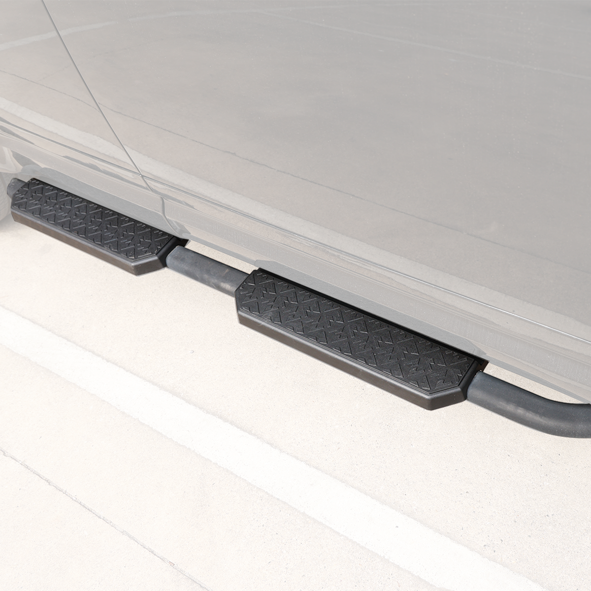 OEM fixed side steps installed on Defender rugged look