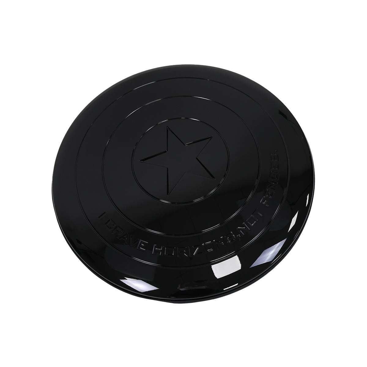 Open center star spare wheel cover showing tire tread Defender design