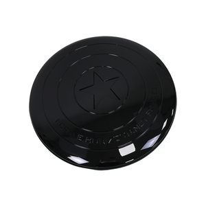 Open center star spare wheel cover showing tire tread Defender design