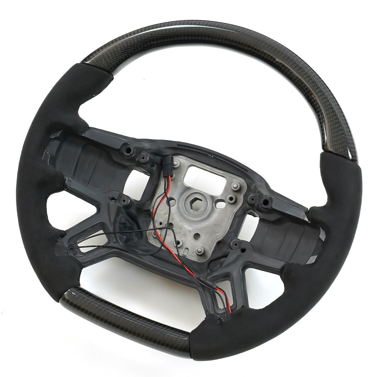 Defender performance steering wheel carbon fiber detail close up