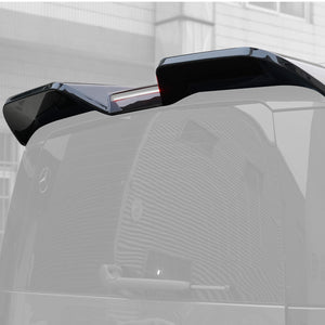 Installed spoiler on Defender with clear brake light visibility