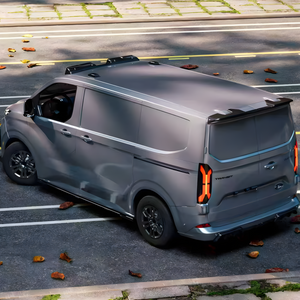 Gloss black body kit installed on Ford Transit