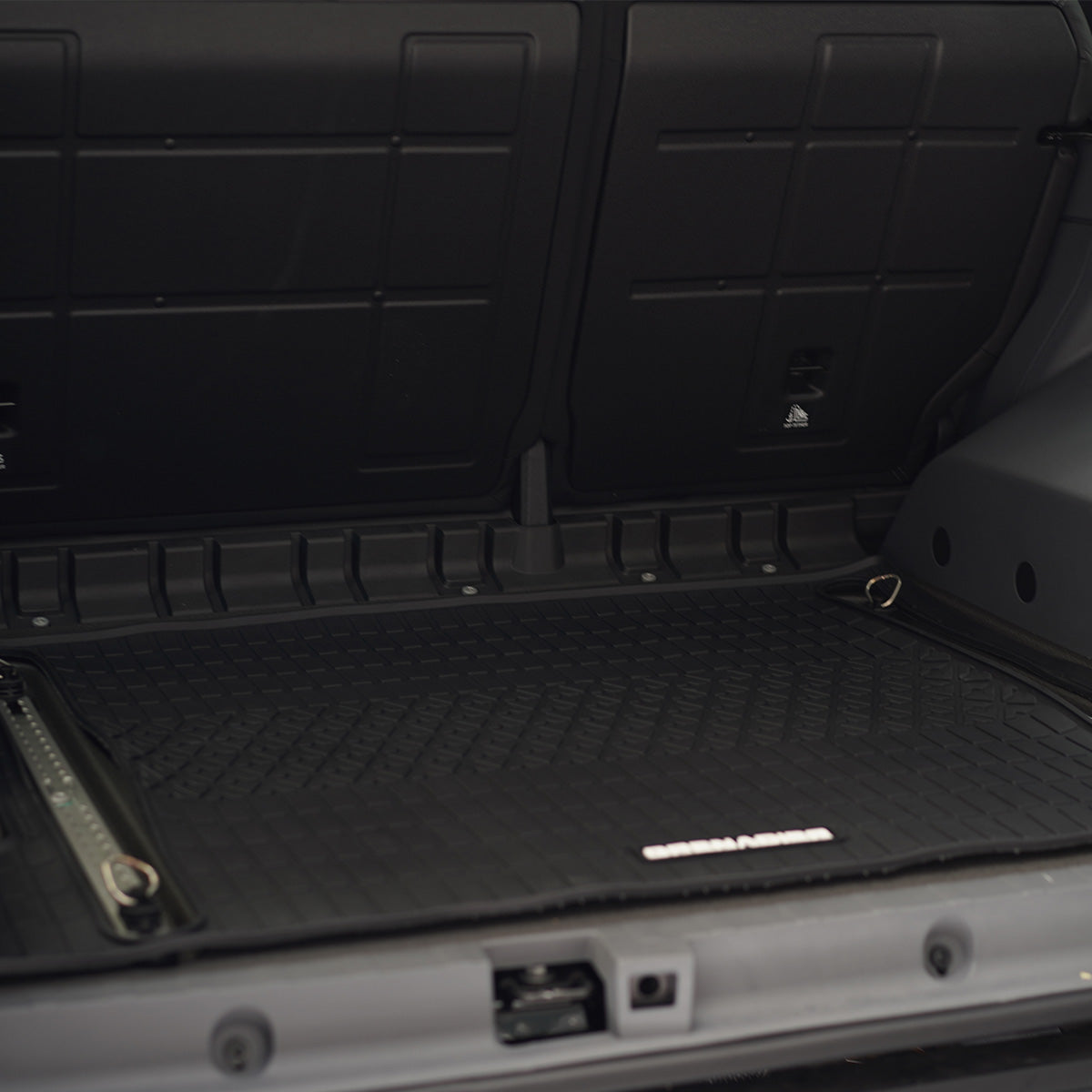 PLOMOR cargo liner in Ineos Grenadier with luggage loading protection