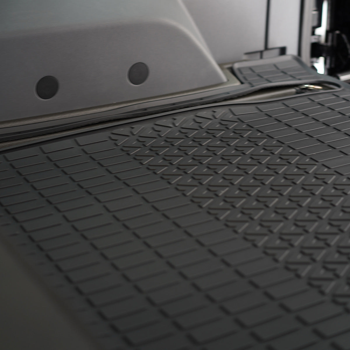 Side view of PLOMOR cargo liner installed in Ineos Grenadier trunk