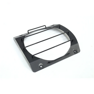 Close-up of black aluminium alloy headlight guards for INEOS Grenadier, showing durable, corrosion-resistant construction.