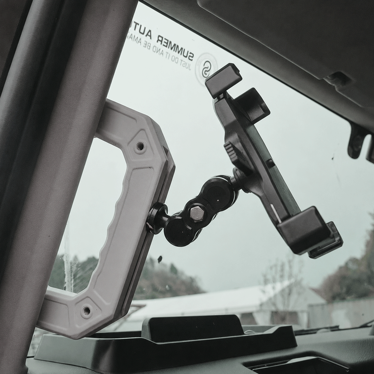 Ineos Grenadier off-road driver side A-pillar grab handle providing entry support and stability