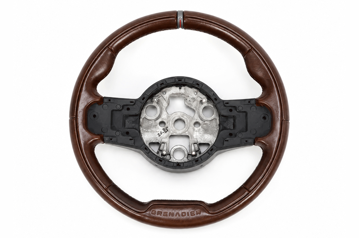 Deeply Embossed PLOMOR Logo - PLOMOR Premium Leather Steering Wheel Cover for INEOS Grenadier