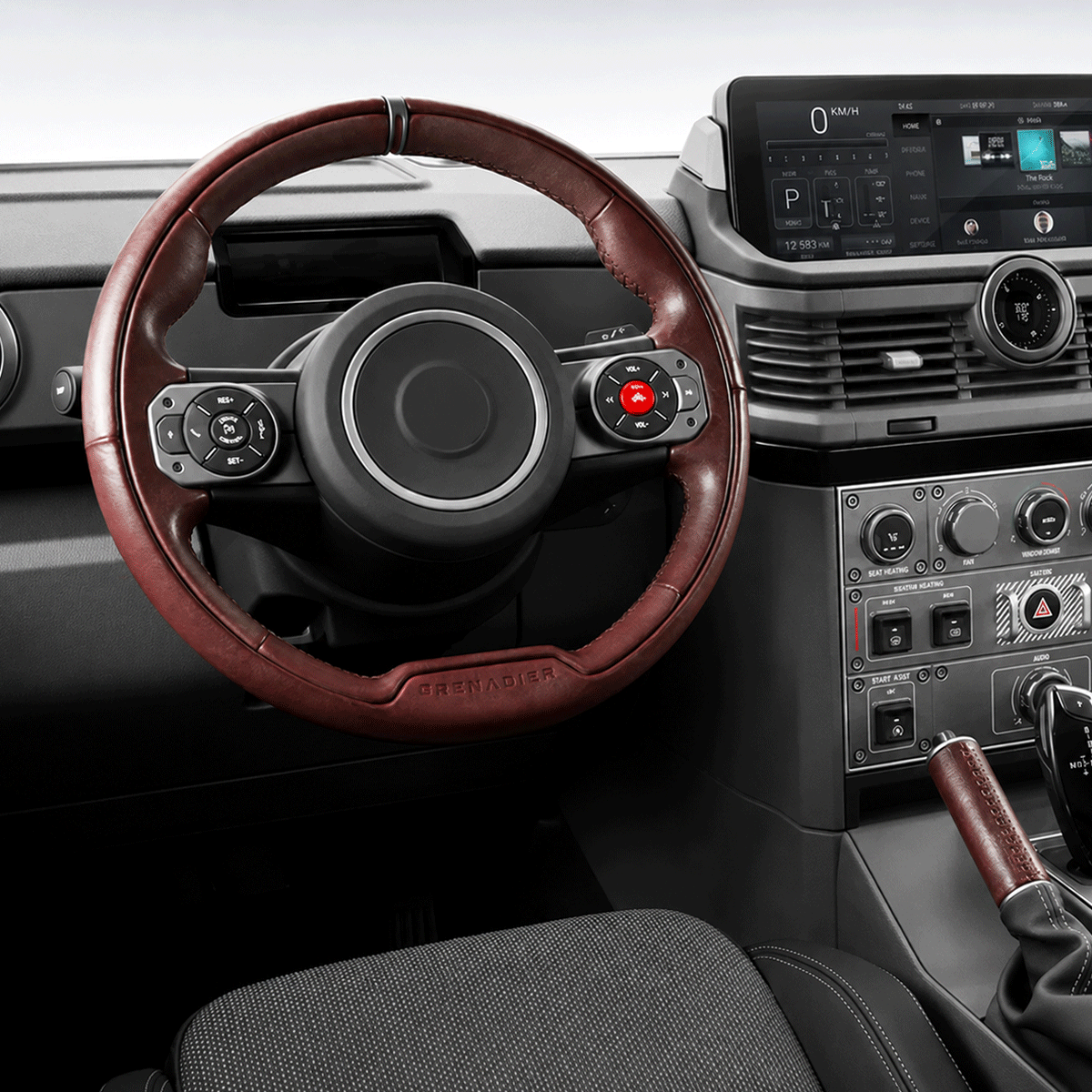 PLOMOR premium leather steering wheel cover installed on INEOS Grenadier OEM+ interior upgrade