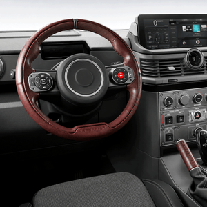 PLOMOR premium leather steering wheel cover installed on INEOS Grenadier OEM+ interior upgrade