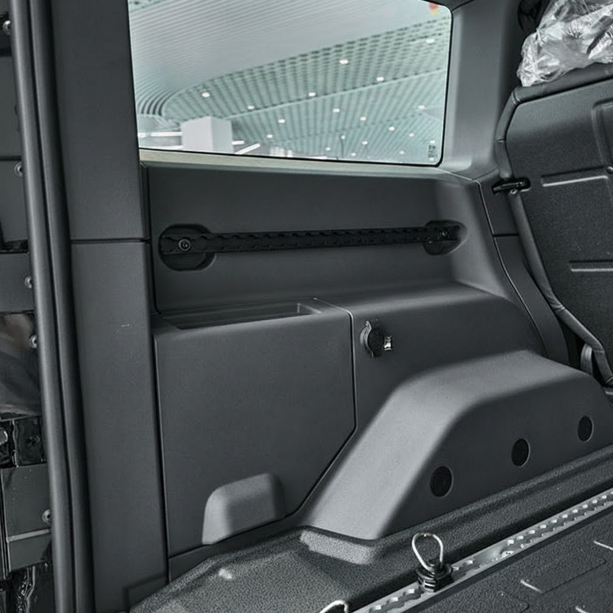 Installed view of the expansion rail system in the INEOS Grenadier trunk.