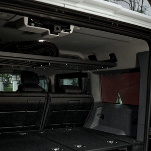 Secure storage of lightweight items on INEOS Grenadier upper rear cargo shelf without using valuable floor space.