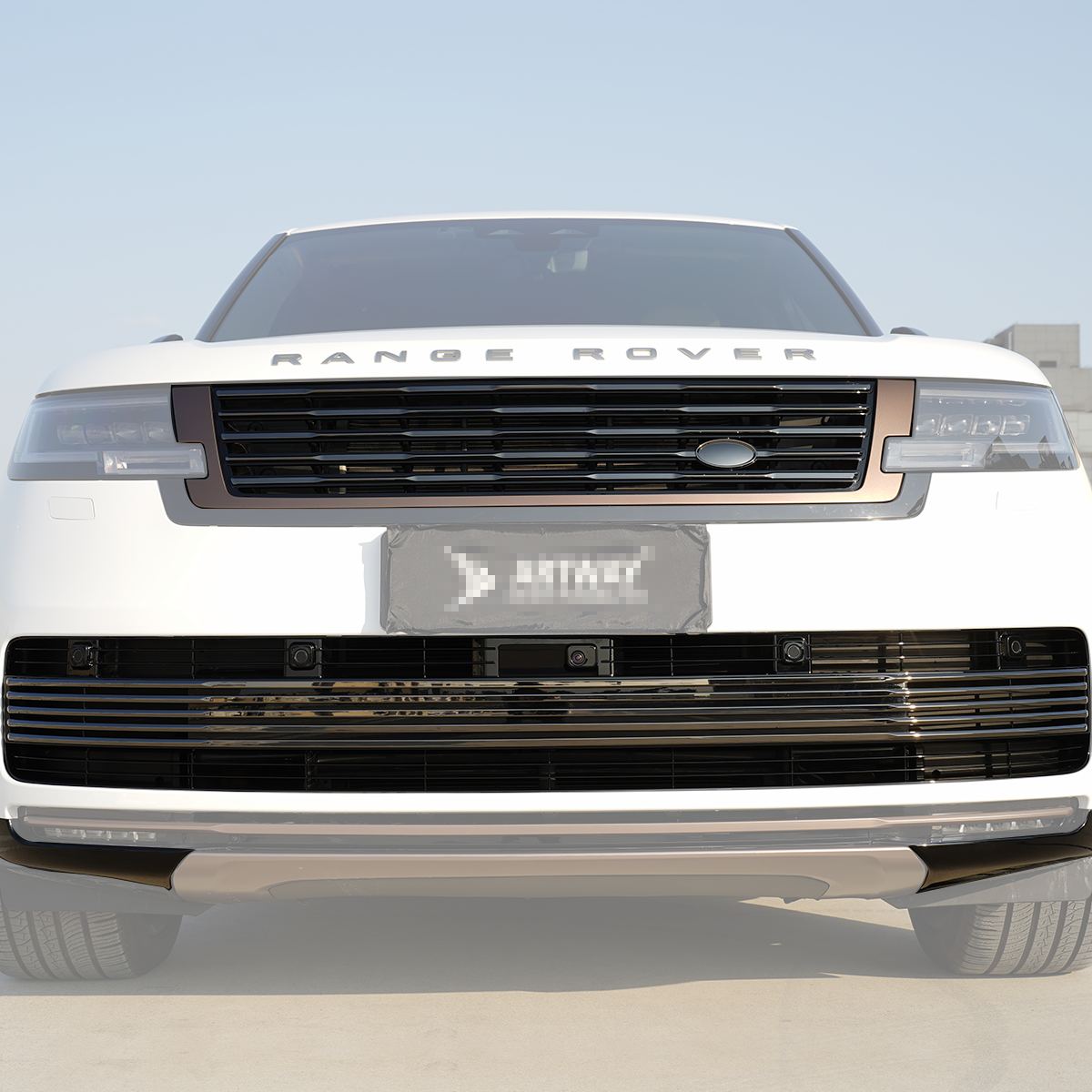 Range Rover L460 driving city with SV body kit installed OEM styling