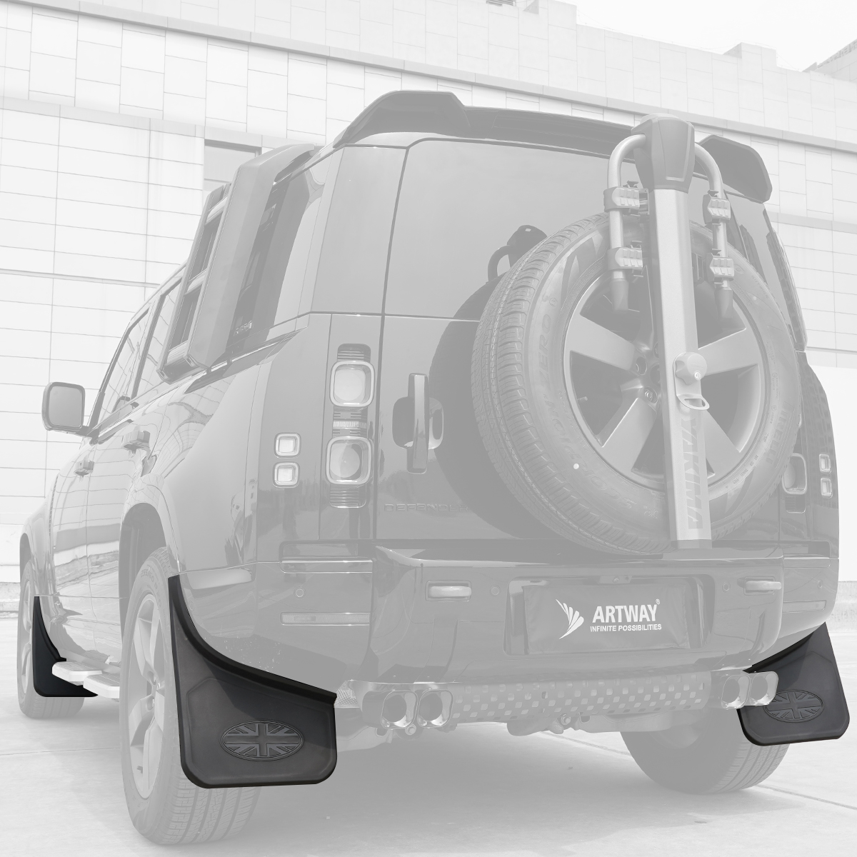 PLOMOR Defender 130 Union Jack Mud Flaps Installed Rear View | ABS OEM Fit