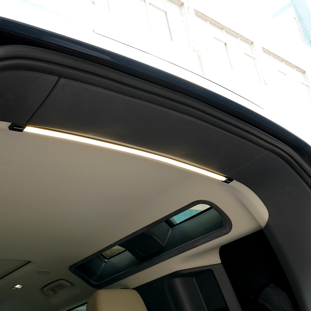 PLOMOR LED Cargo Light Bar Installed in Defender | Night Boot Lighting