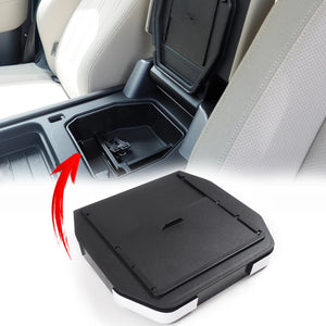 Sliding lid armrest hidden storage compartment for Defender L663