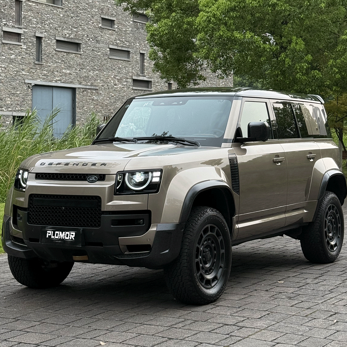 land-rover-defender-l663-forged-carbon-front-lip-extensions-installed.jpg