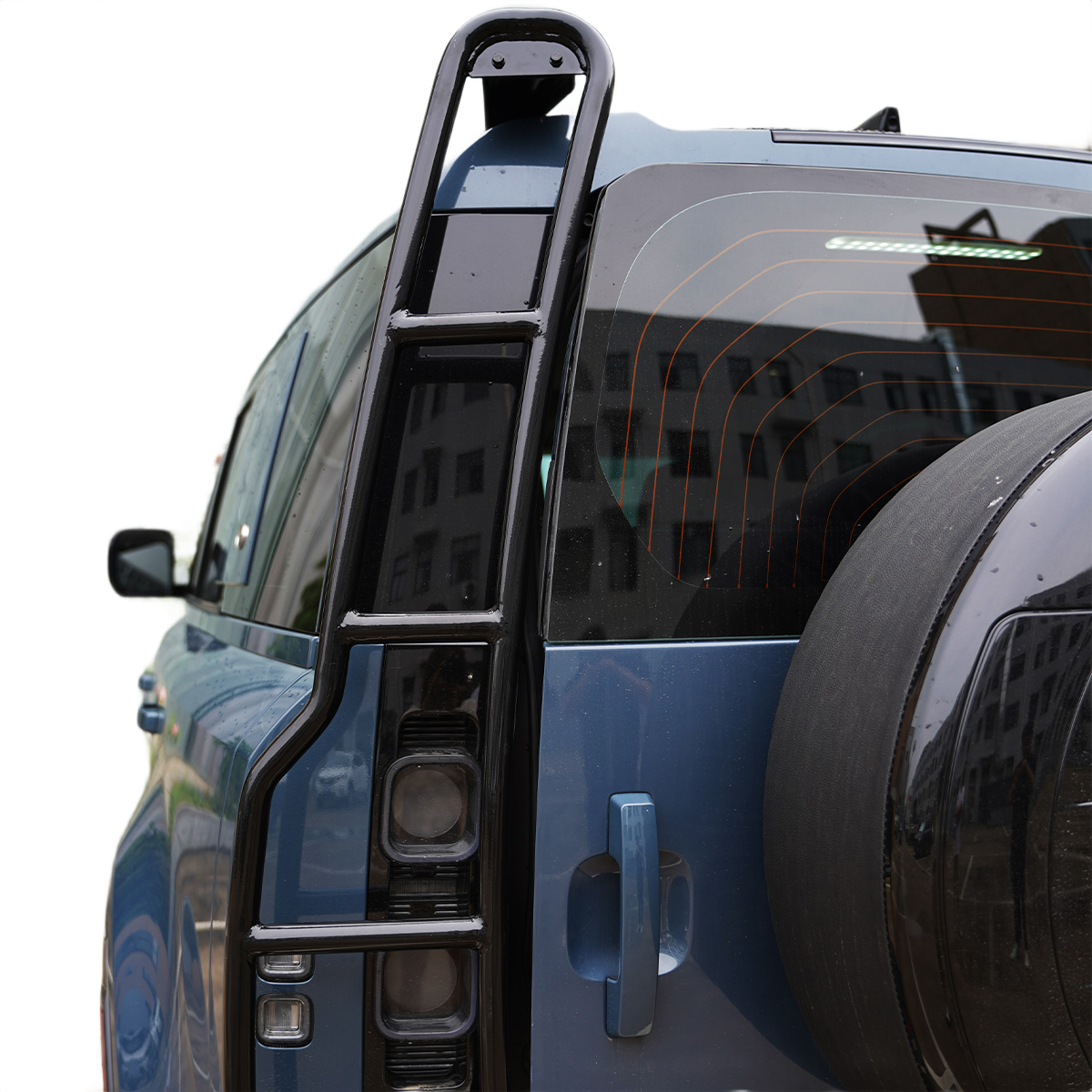 Safe roof access using Land Rover Defender rear ladder