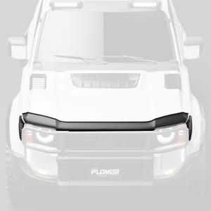 Close-up of black PP front bug shield hood deflector installed on Toyota LC250 showing precise fit and edge details
