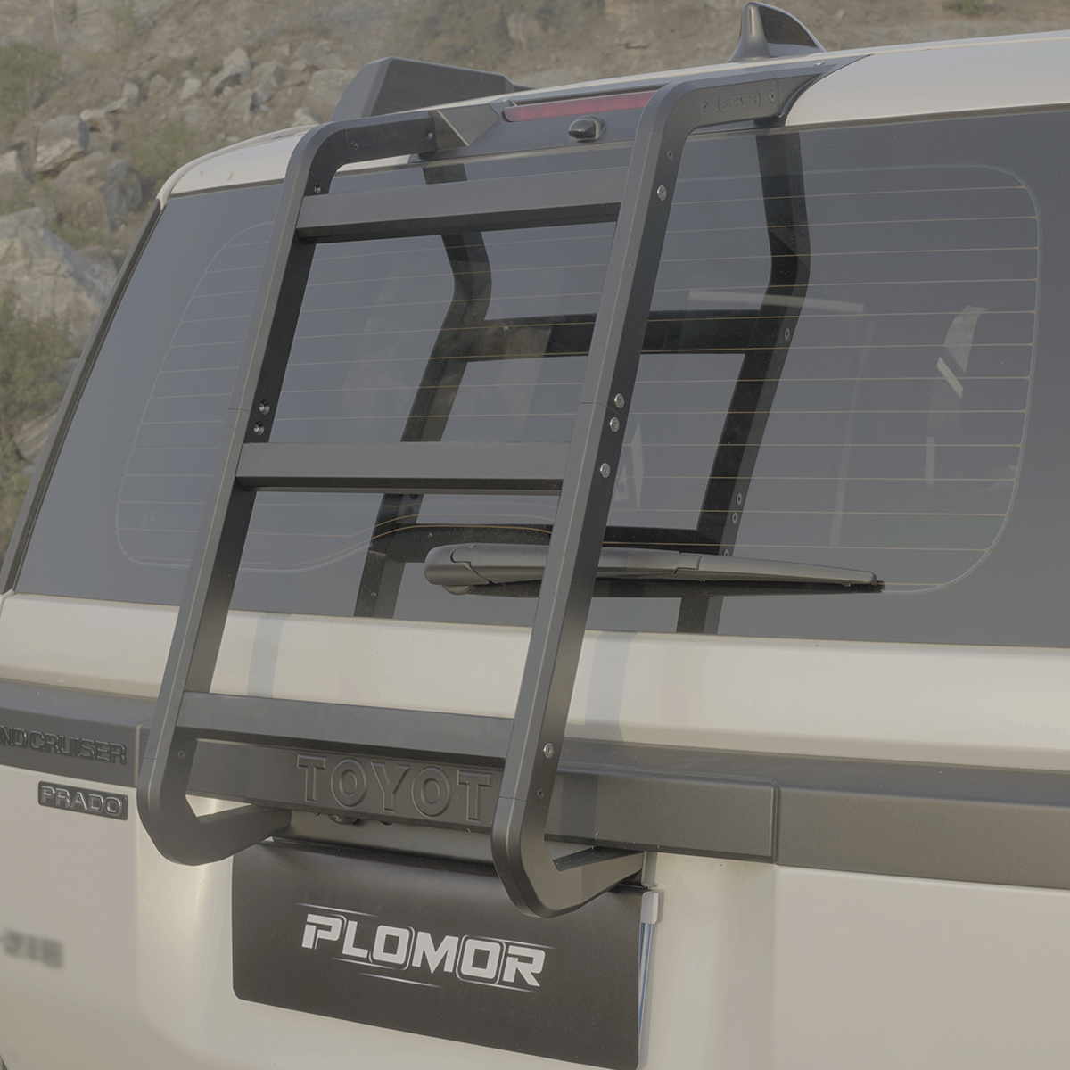 LC250 Prado J250 rear roof access ladder with matte black aluminium finish