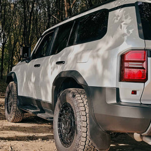 Toyota LC250 rear fender flares 49mm extension installed mud and debris protection
