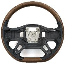 Close-up luxury walnut and Nappa leather steering wheel for Defender